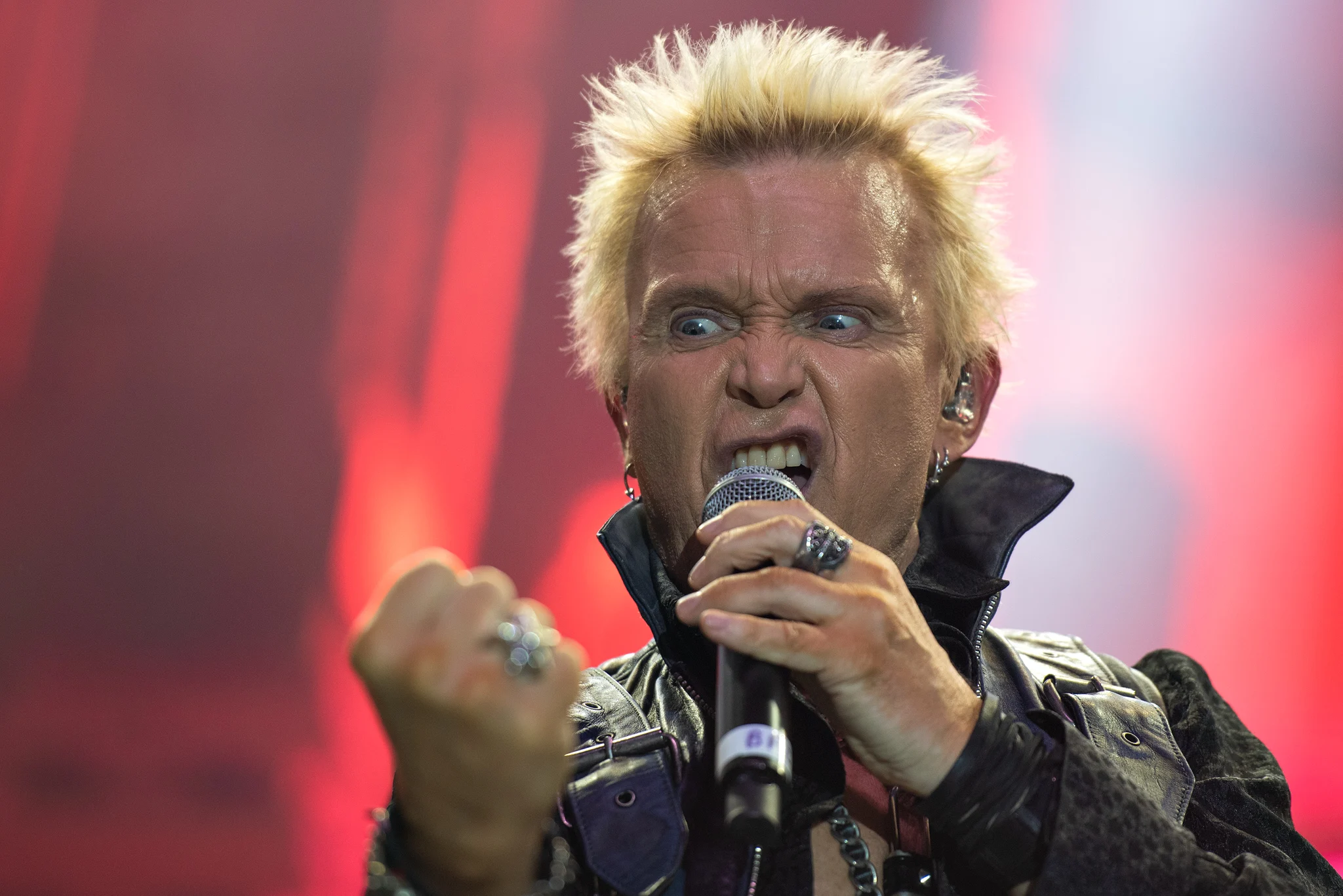 Billy Idol performing live on stage
